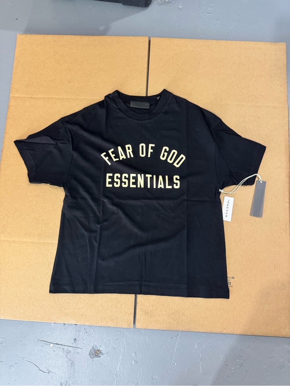 Fear of God Essentials Black T-Shirt with Cream Logo